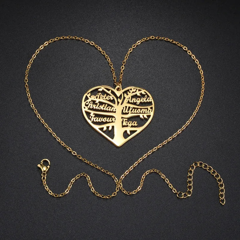 Personalised name necklace with hollow heart and tree pendant in silver, gold, or rose gold on a metal chain.