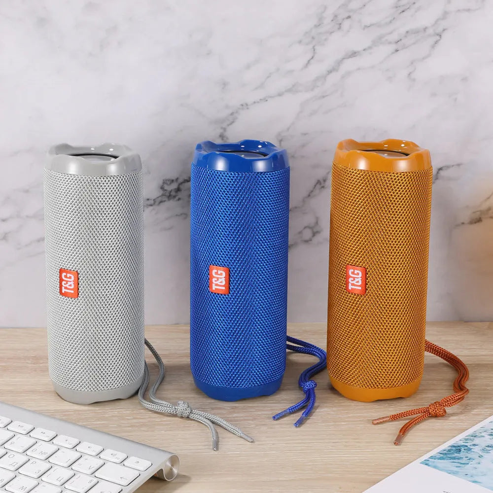 Portable fabric Bluetooth speaker with card holder in multiple colour options showing dimensions 182 x 73.5 x 69.2 mm
