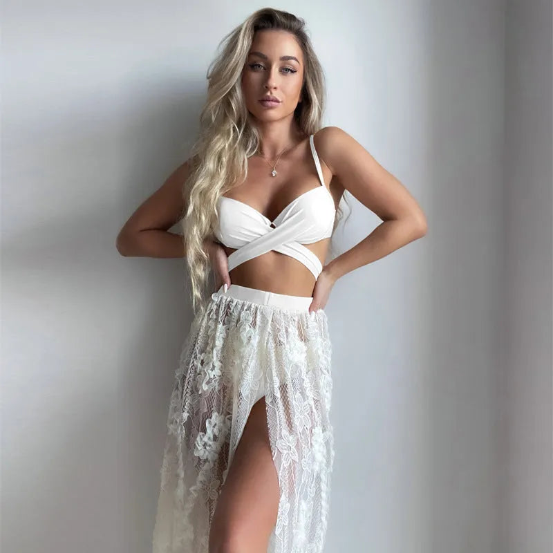Three-piece push-up bikini set with backless top and matching skirt in polyester fabric