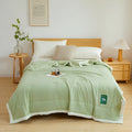 Antibacterial raw cotton washable summer cool quilt in Haze Blue colour, showing quilted pattern and fabric texture