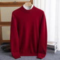 Man wearing a loose-fit half-collar wool sweater in a textured knit, shown in one of the available colours like camel or dark grey.