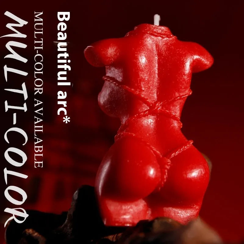 Smsexy Props soy wax bikini-shaped fragrance candle in red, pink, or purple.