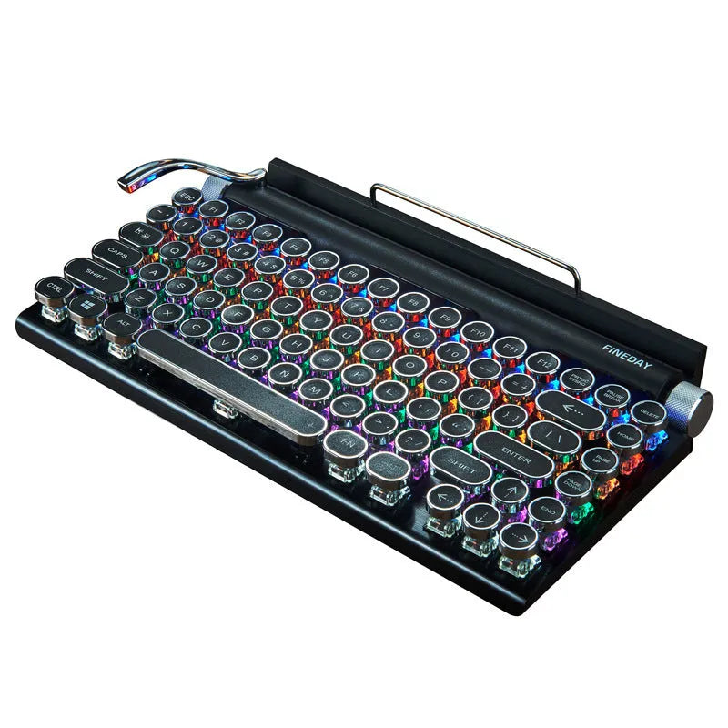 Black retro typewriter style mechanical keyboard with backlit keys on a desk