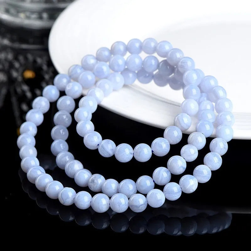 Natural blue agate bracelet with multi-circle patterns and approximately 86 beads measuring 6-6.8mm diameter