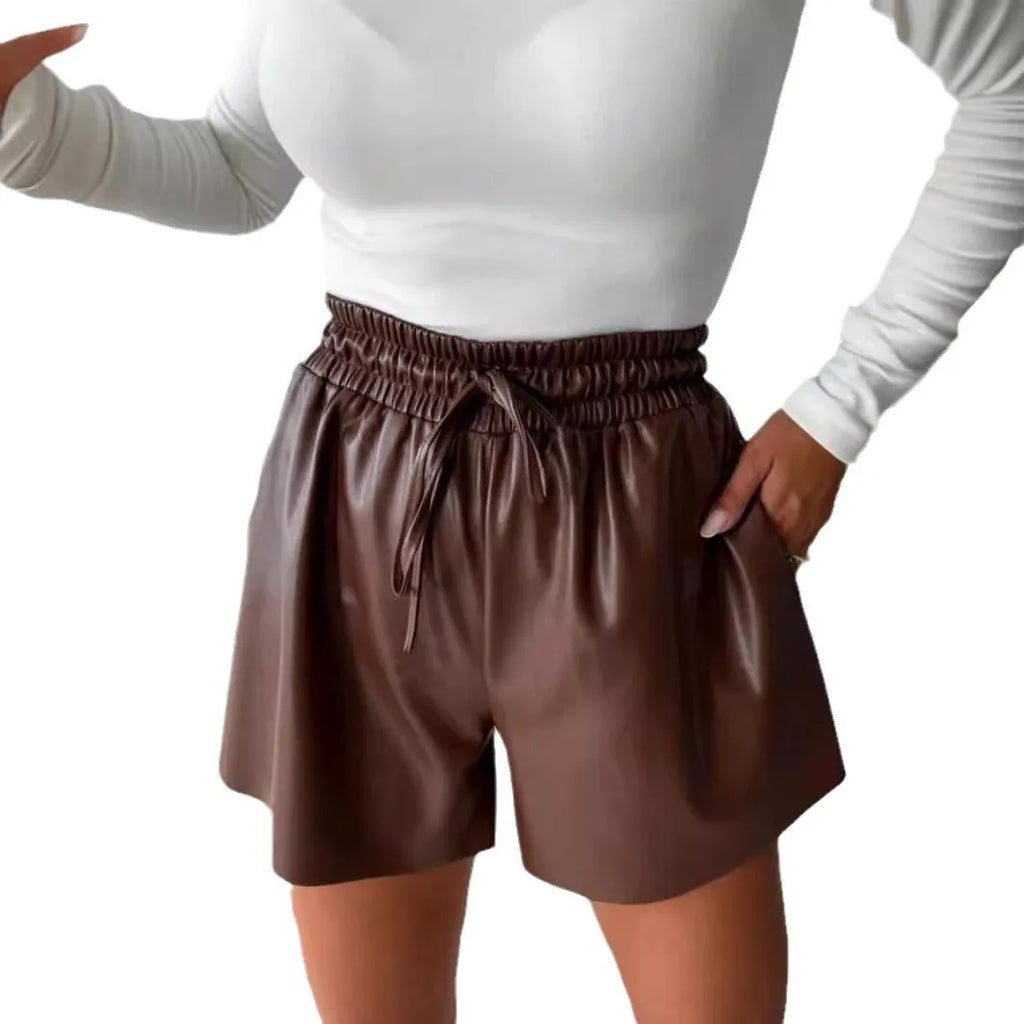 Women's black casual shorts with lace trim detail and wide-leg silhouette