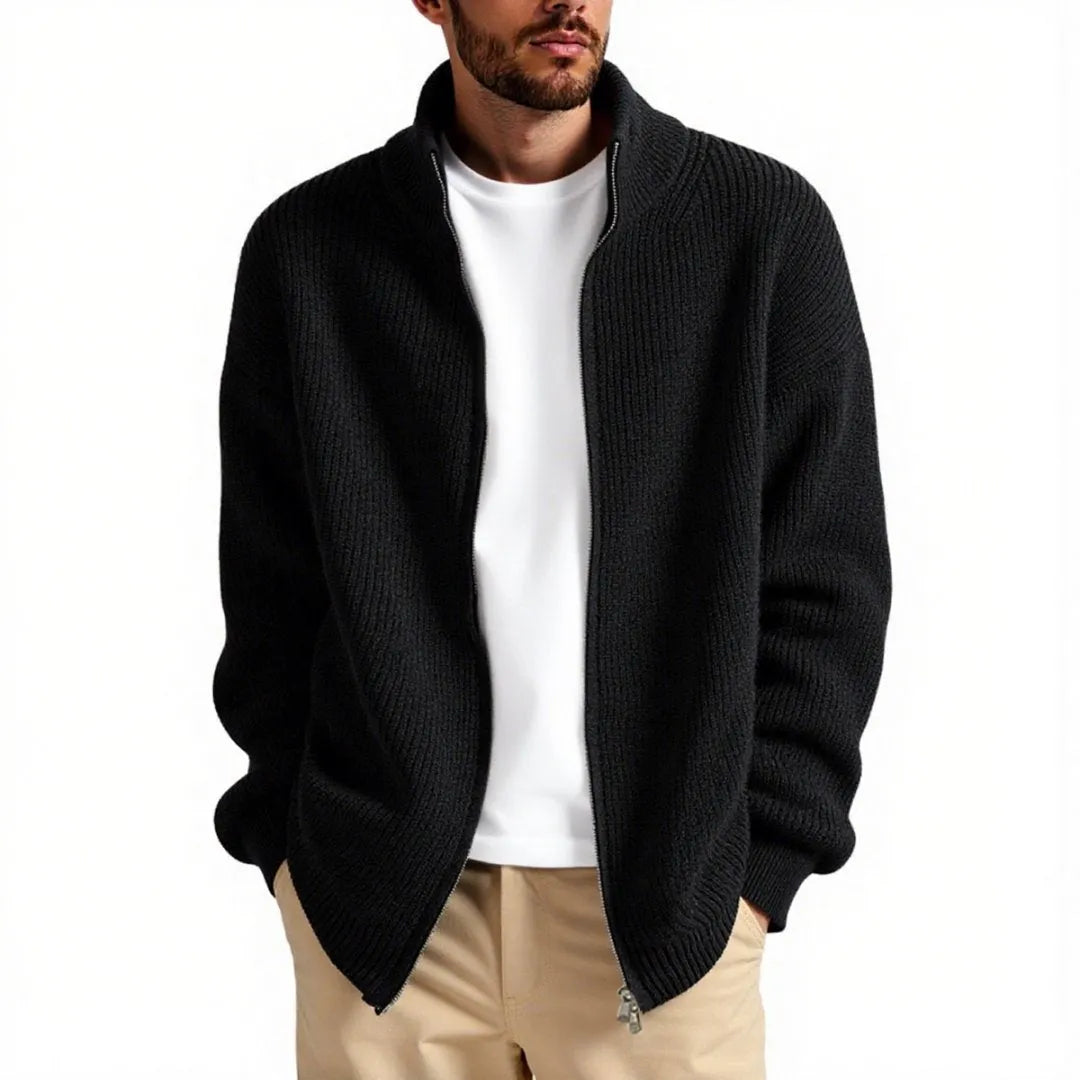 Man wearing a loose-fit grey cardigan sweater coat for casual leisure wear.