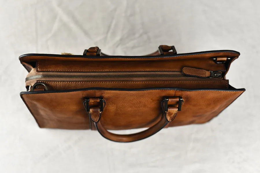 Men's brown leather business handbag with horizontal square design and zipper closure