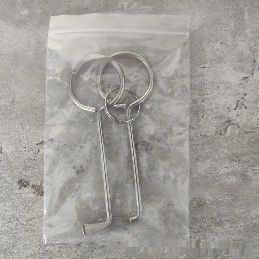 Two alloy wrench tools from portable family repair set
