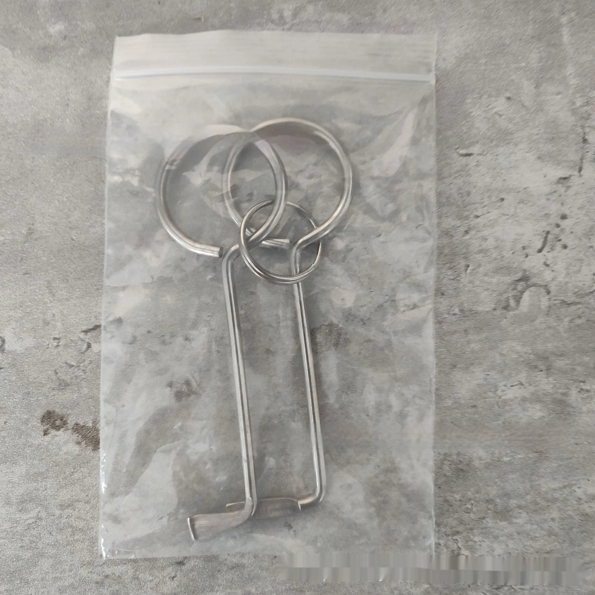 Two alloy wrench tools from portable family repair set
