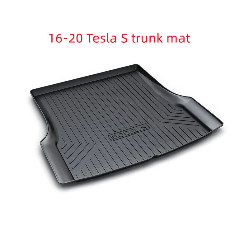 Custom rubber floor mats for Tesla cars with a textured TPE driver footrest section.