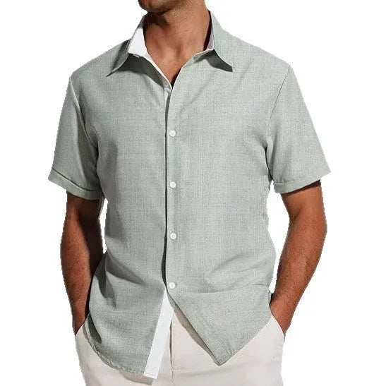 Men's short-sleeved floral print shirt in light business style on a hanger