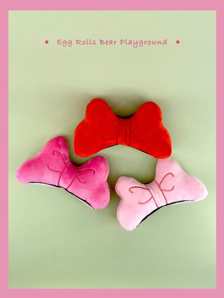 Plush bow decoration for motorcycle and ski helmets in red, peach pink or rose pink