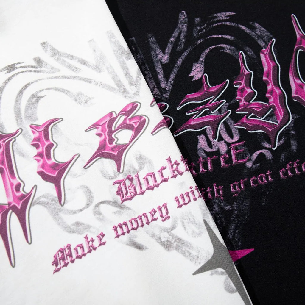 Retro design printed men's cotton t-shirt in black, showing loose fit and short sleeves.