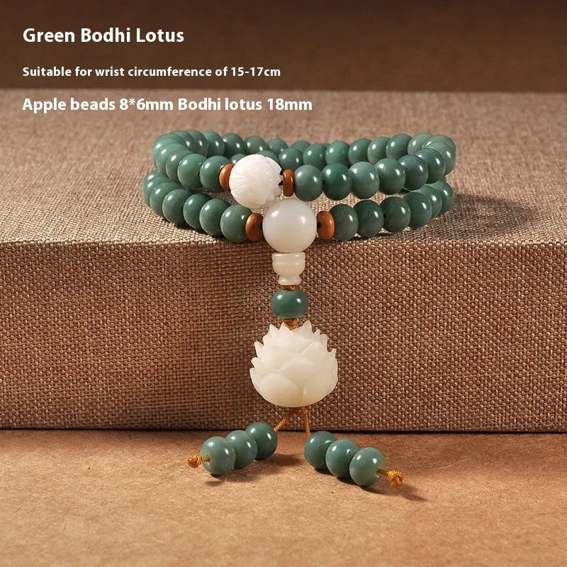 White Jade Bodhi Green Sandalwood Bracelet with Bodhi seed beads, lotus charms, and a double ring safety clasp.