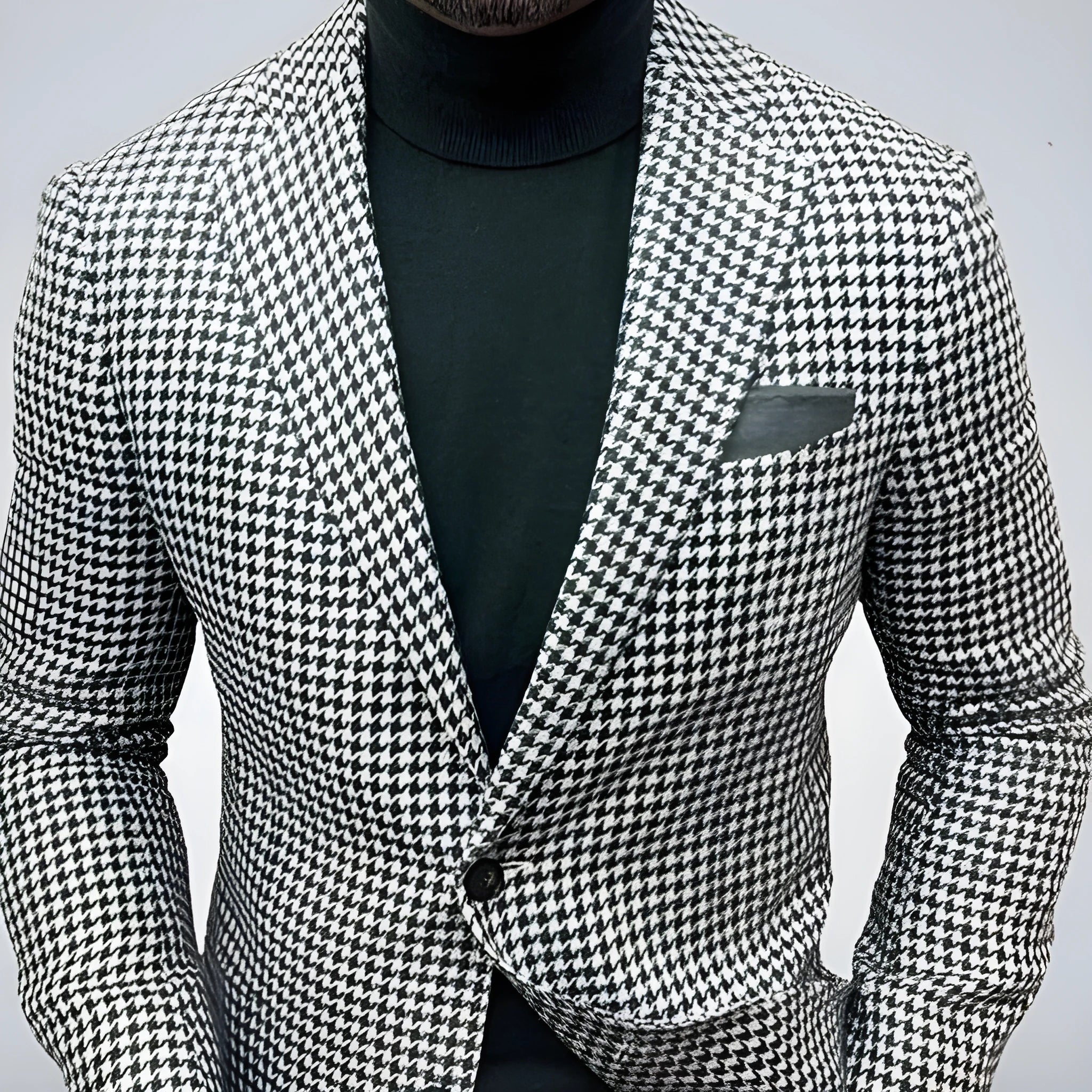 Men's black slim fit suit jacket with two buttons and large top-stitching pockets