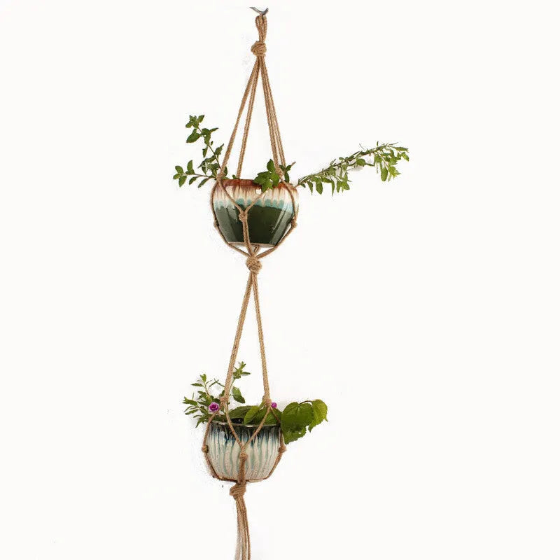 Handwoven natural cotton rope plant trellis mesh panel for climbing vines on a wall