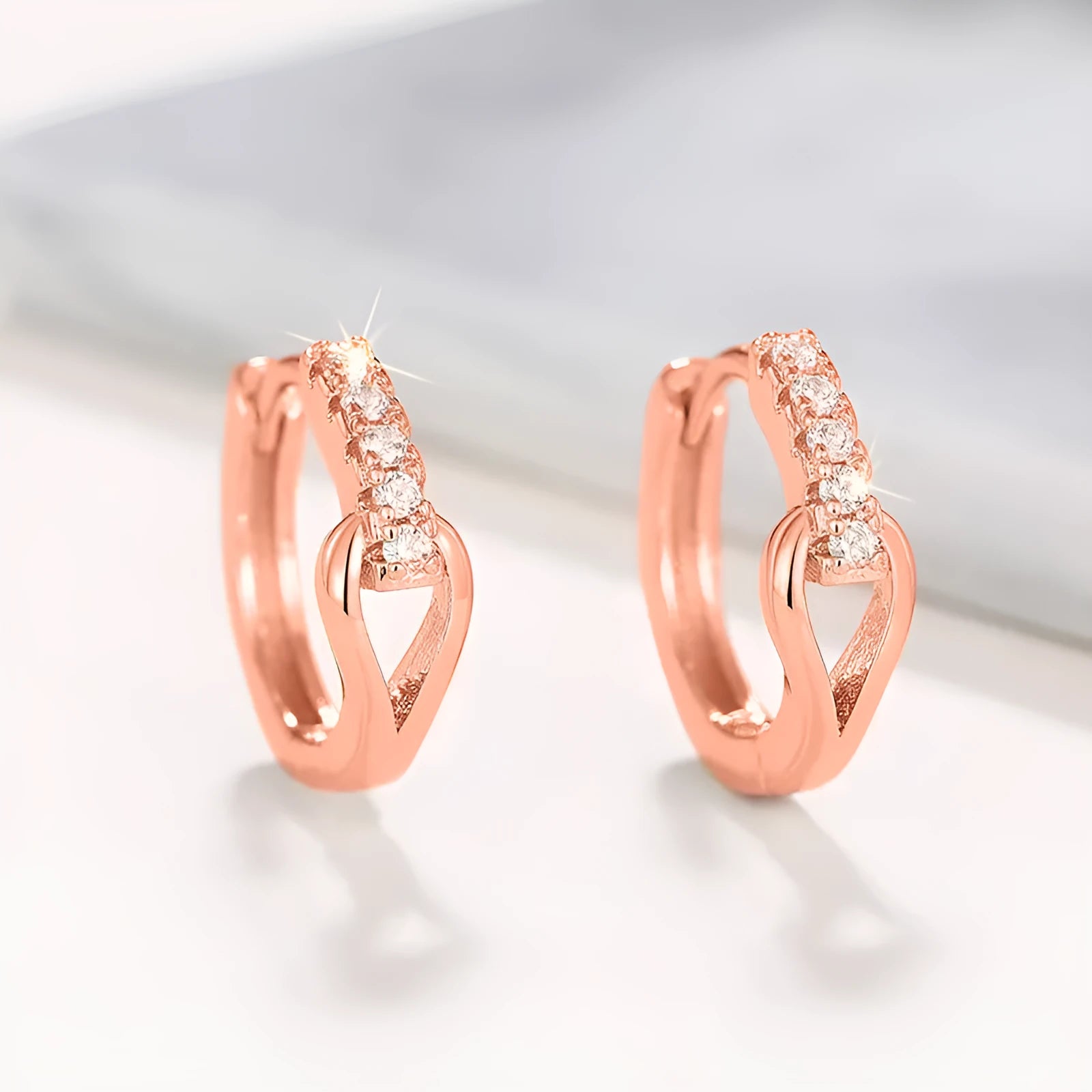 Copper geometric earrings with inlaid zircon in white gold colour on women