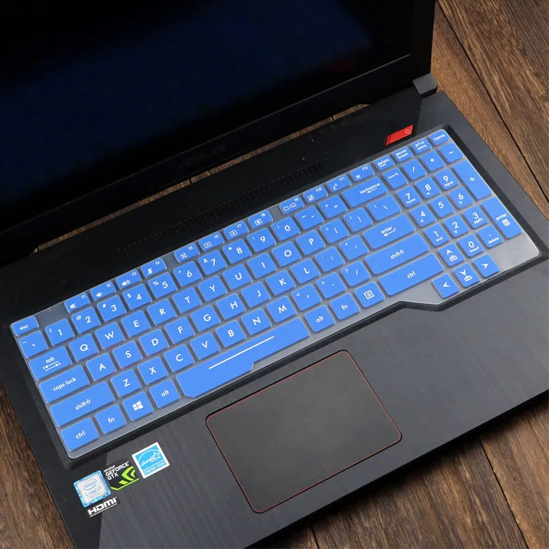Transparent silicone keyboard protective film for ASUS Flight laptop on a keyboard.