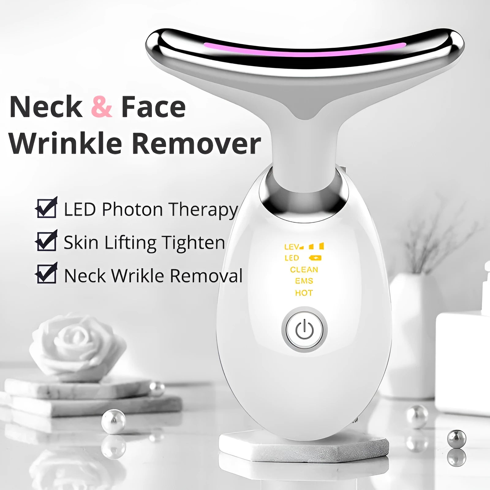 White EMS thermal neck lifting massager device with LED lights on a stand with USB cable