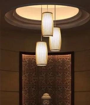 Southeast Asian woven bamboo plait wall lamp with E27 light fitting