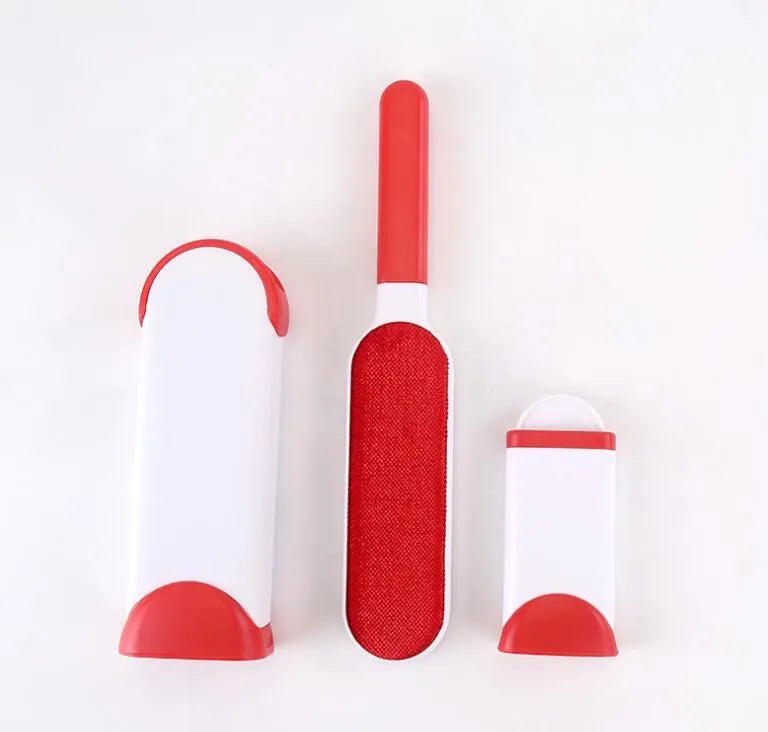 Reusable pet hair removal brush with double-sided roller and self-cleaning base