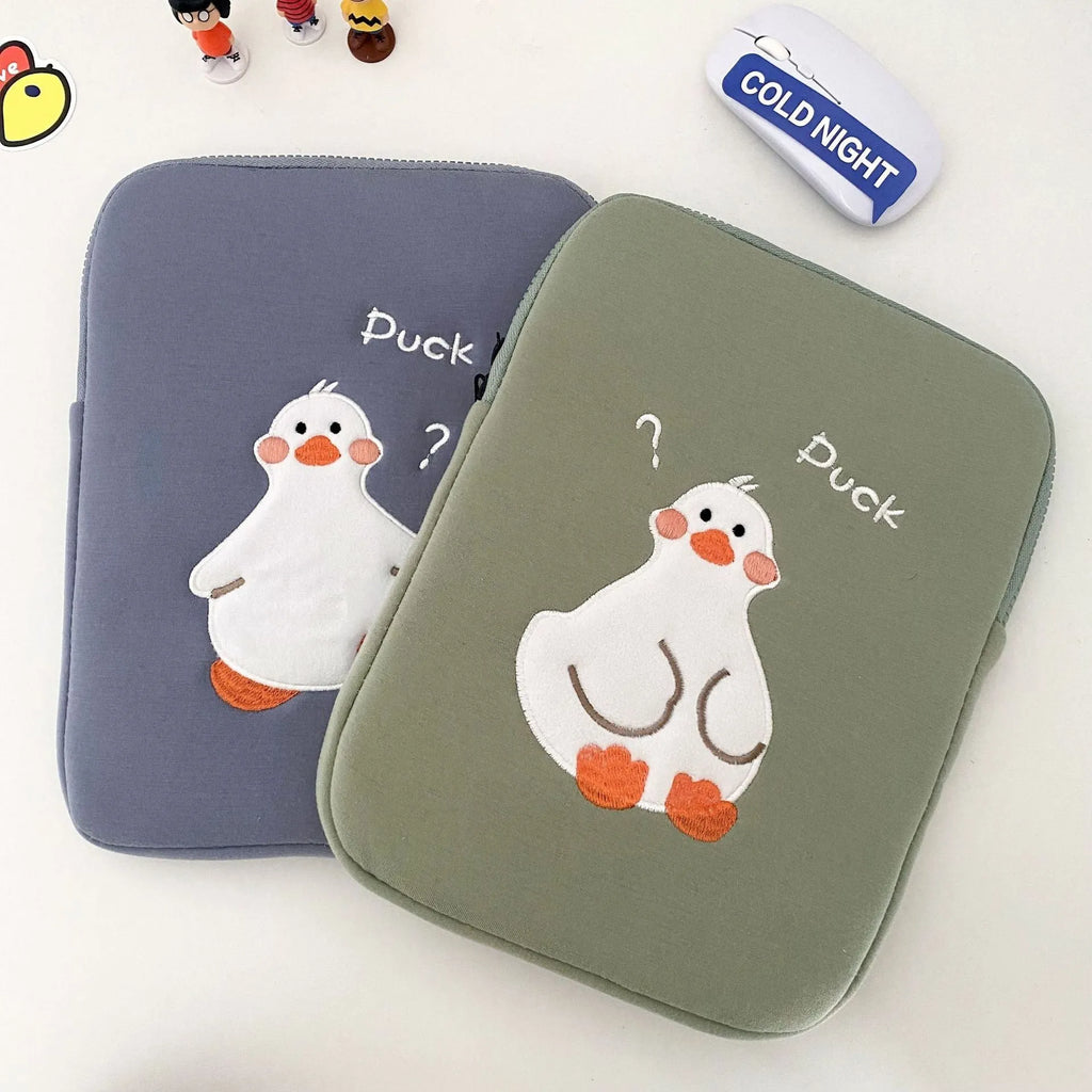 Blue cotton tablet case with embroidered cartoon duck design and zipper opening