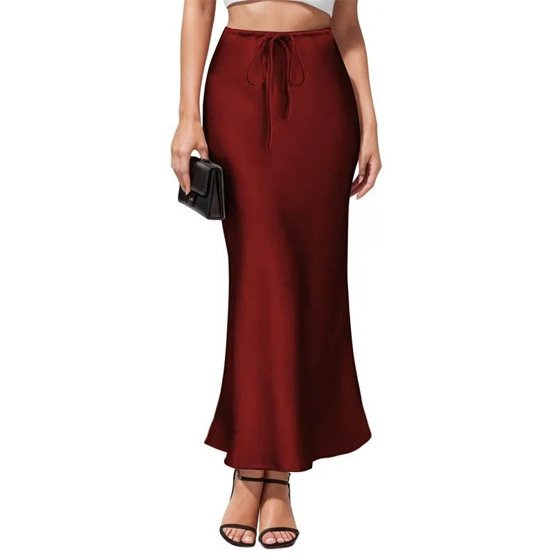 Acetate satin asymmetric skirt with irregular stitching in high-waist design, showing colour options