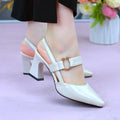 Women's apricot-coloured leather sandals with a closed toe, backless design, chunky heel, and an oversleeve strap.