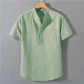 Men's beige casual short sleeve linen shirt with a stand collar and loose fit on a hanger.