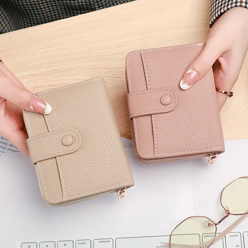 Ladies' short wallet with lychee pattern in beige, showing 2-fold design and card slots