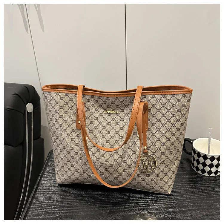 Street trend shoulder bag made from PU material with sewing thread decorative elements