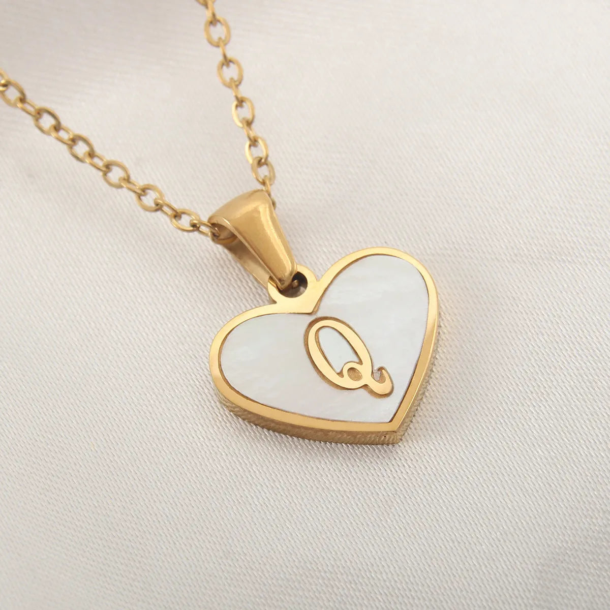 Gold plated personalised heart necklace with white shell on a 45cm chain