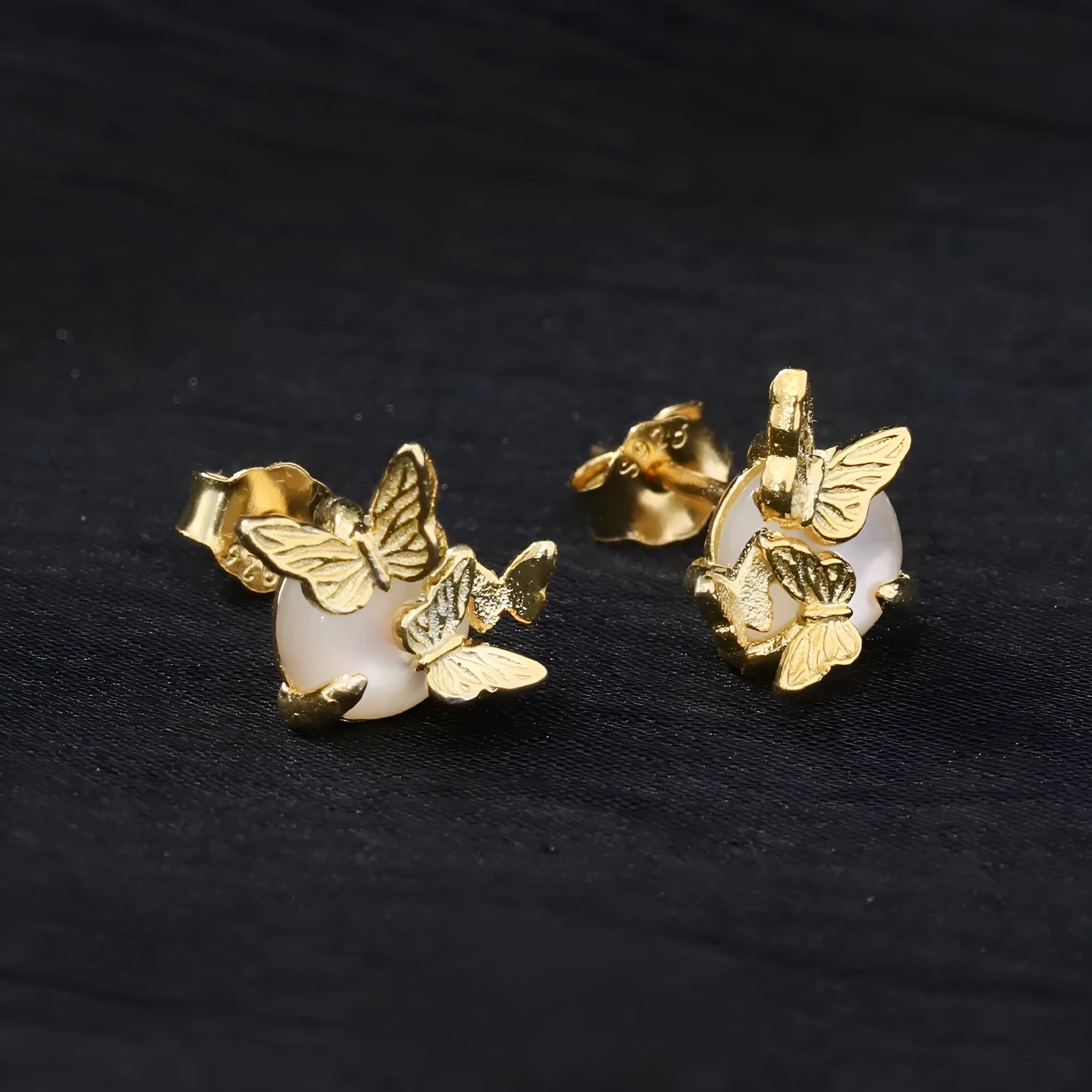 925 silver butterfly ear studs with electroplated finish in original cold style design