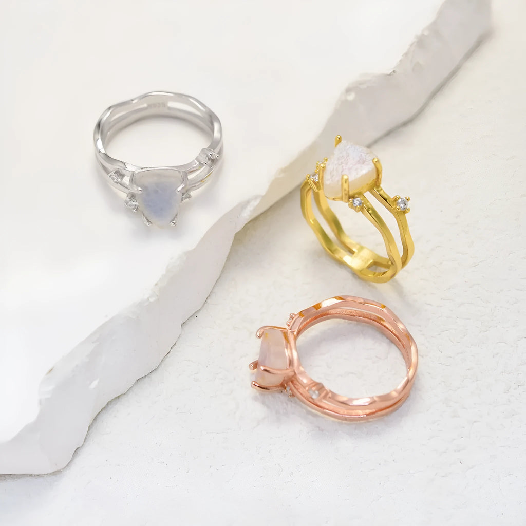 S925 silver geometric ring with irregular triangle design and moonstone detail in rose gold electroplating