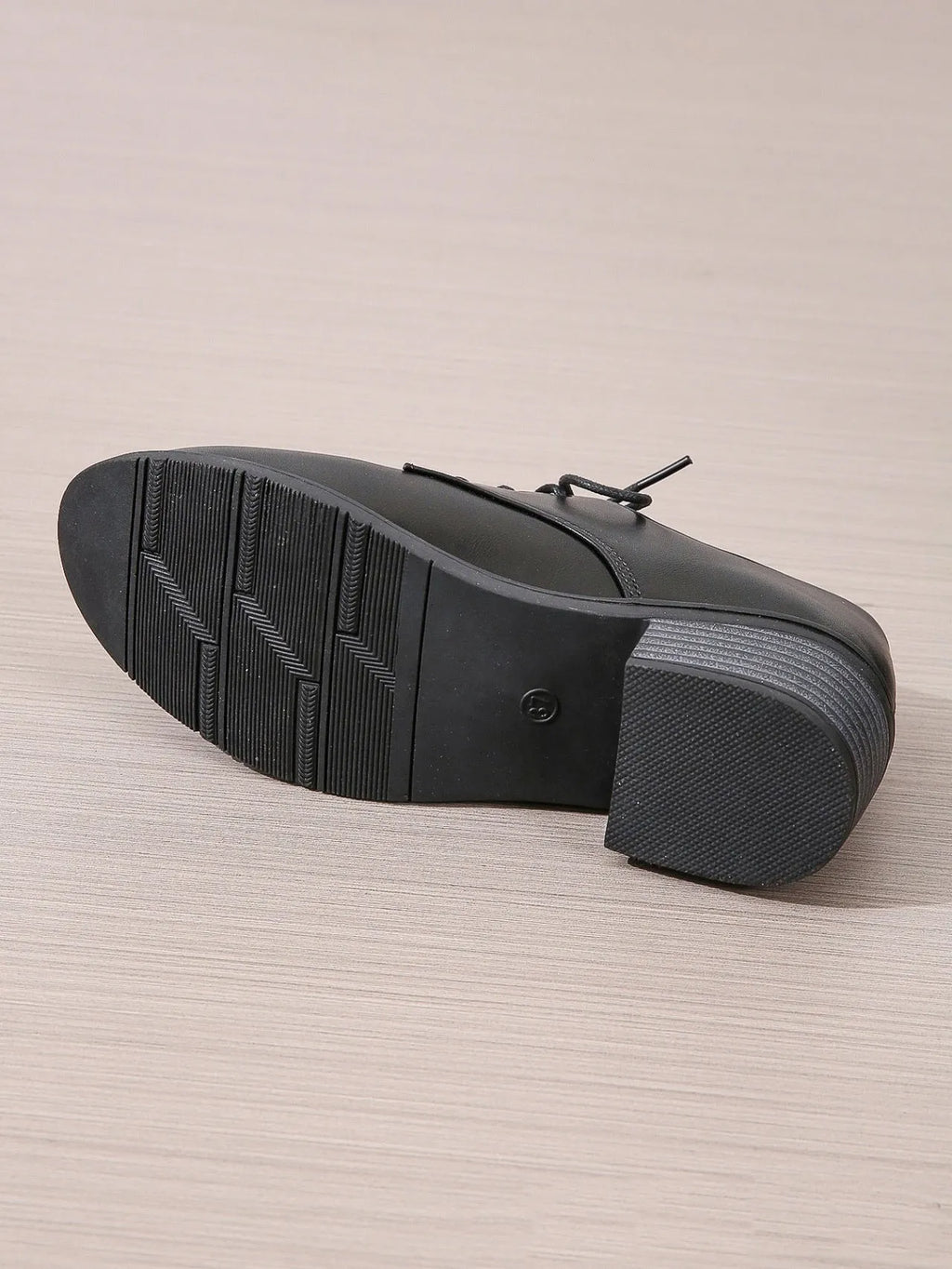Black women's work shoes with chunky heel and soft rubber sole