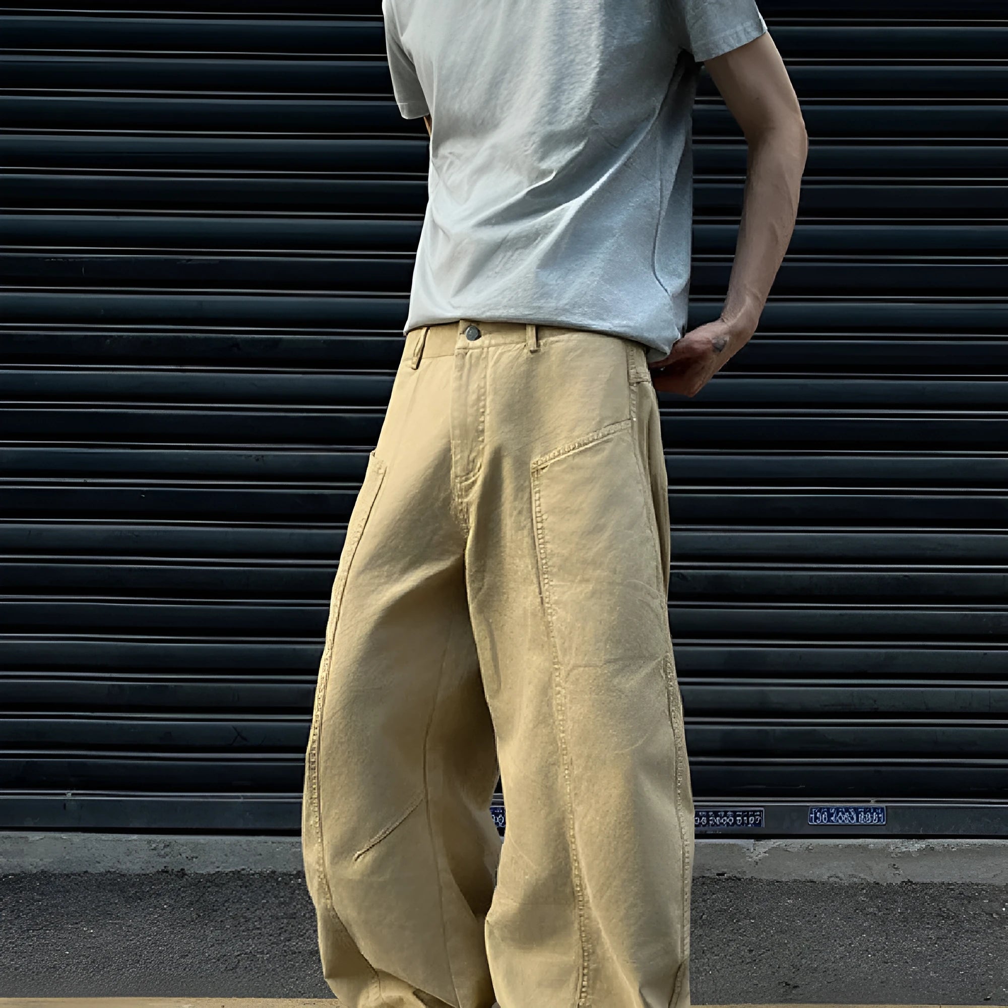 Khaki straight-leg cotton trousers on hanger showing American retro styling