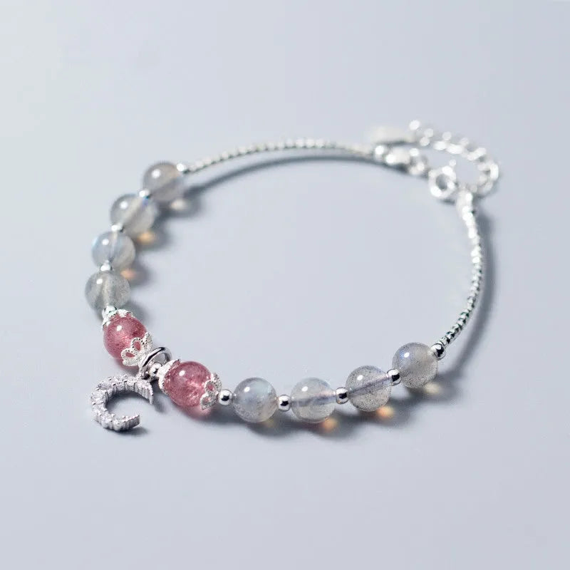 Natural moonstone adjustable bracelet with 6mm gemstone on wrist showing extension chain