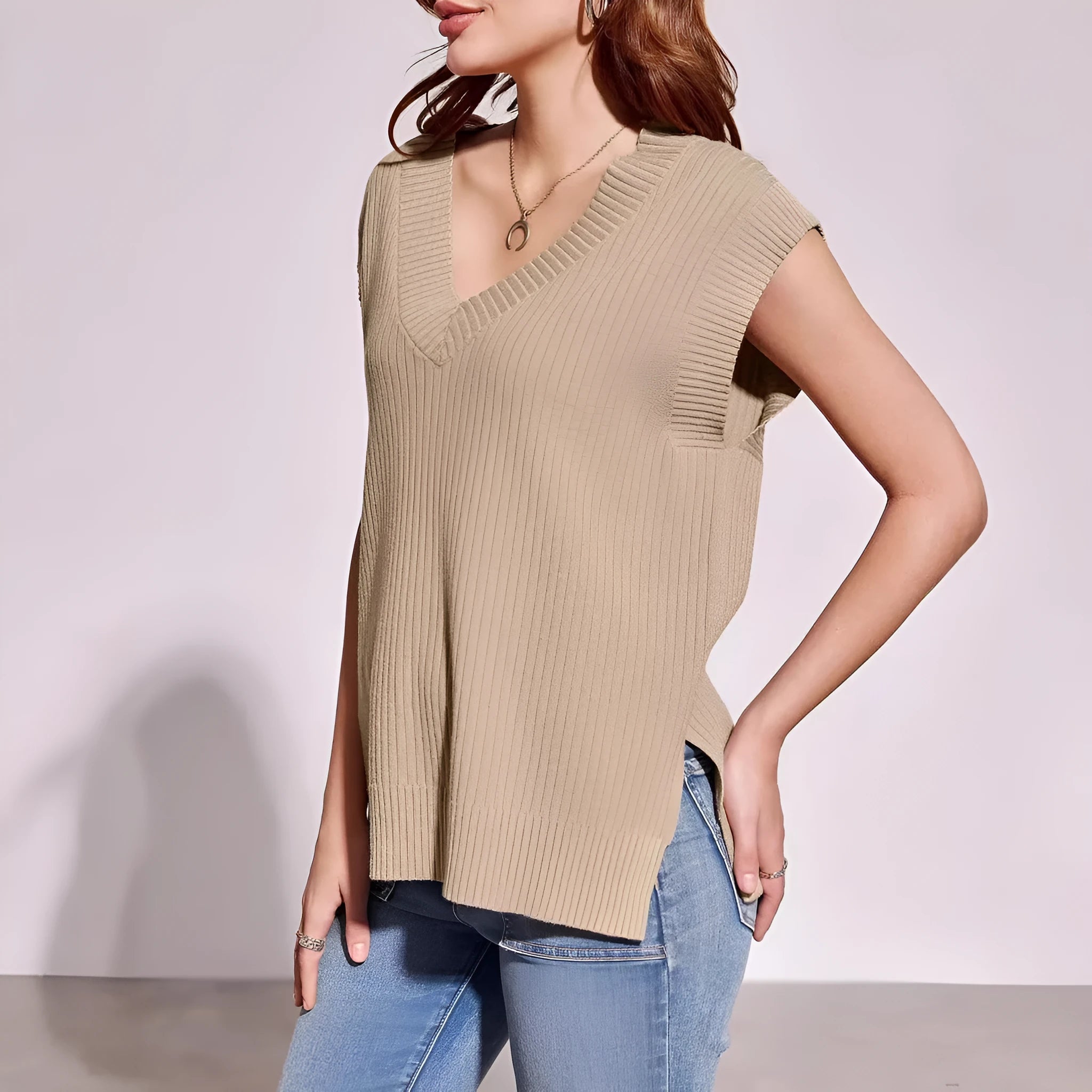 Camel and white v-neck sleeveless loose vest with striped or plaid pattern