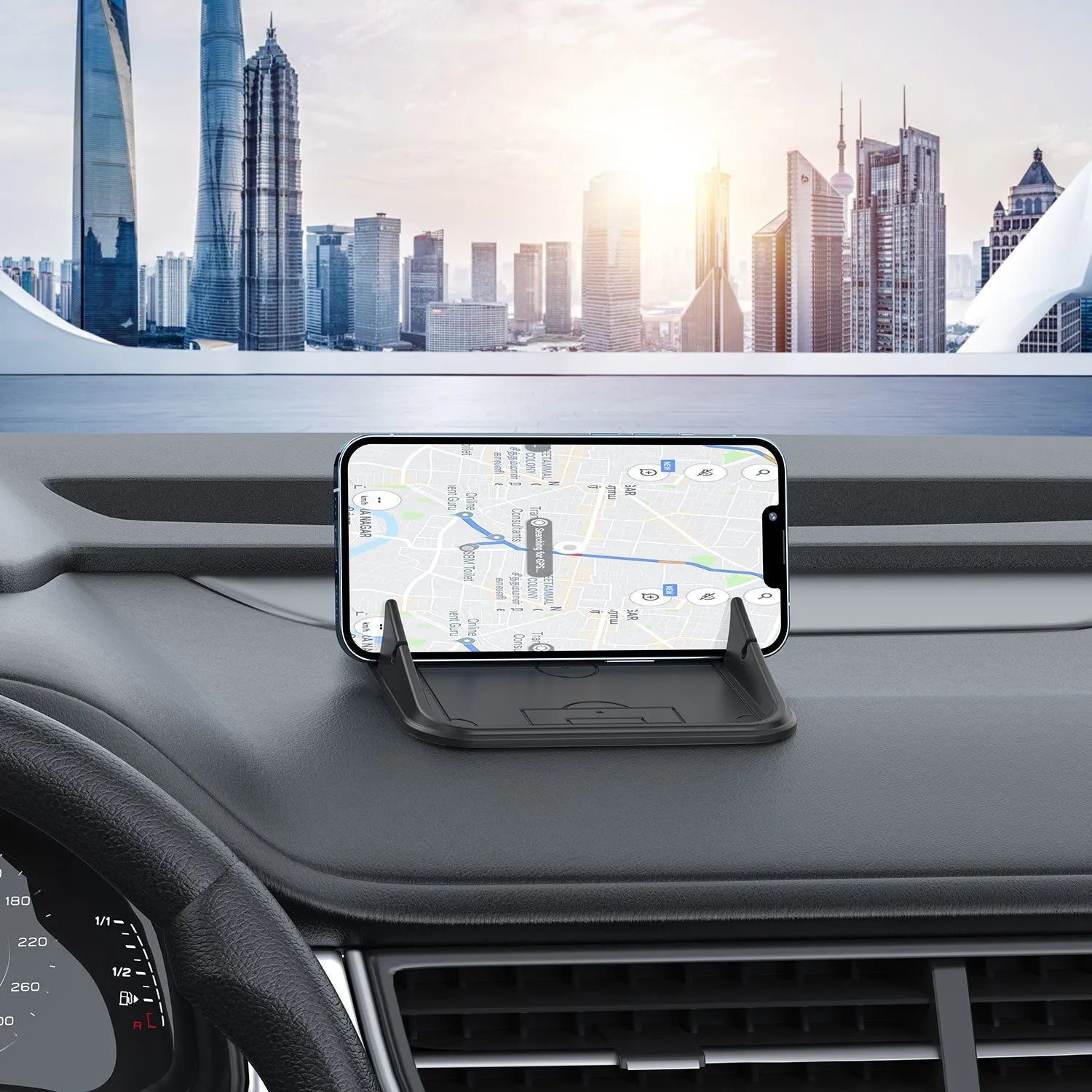 Silicone automobile phone holder Peak-X5 on car dashboard with phone attached