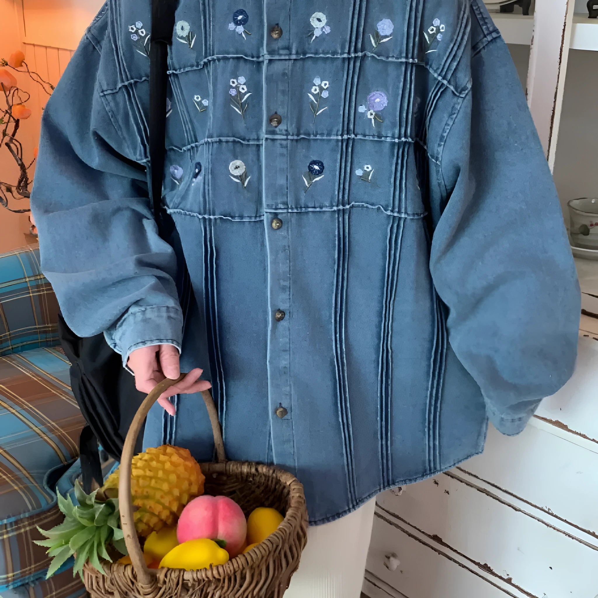 Vintage small floral pleated washed denim long sleeved blue shirt on hanger