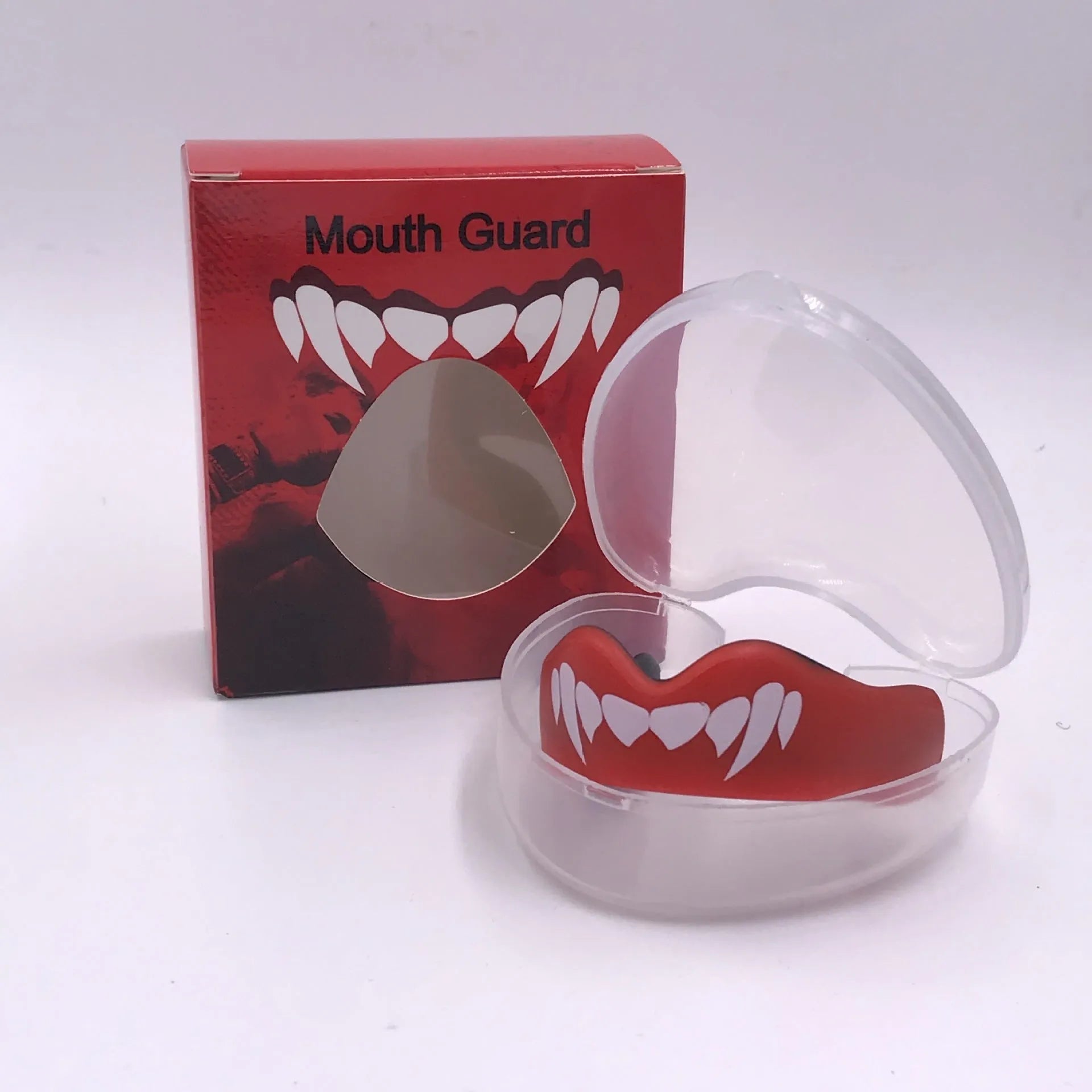 Adult boxing mouthguard with tooth socket design in black and white, red and white, and blue and white colour options.