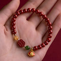 Cinnabar emperor sandstone bracelet with fu character symbol in new Chinese style design