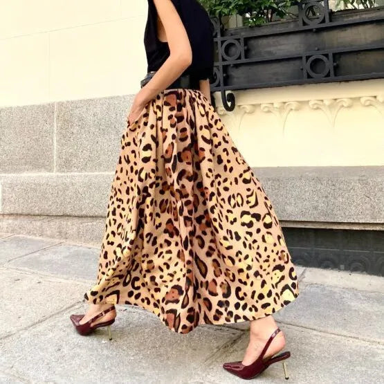 Brown leopard print women's A-line skirt with long length and big hem in polyester fabric