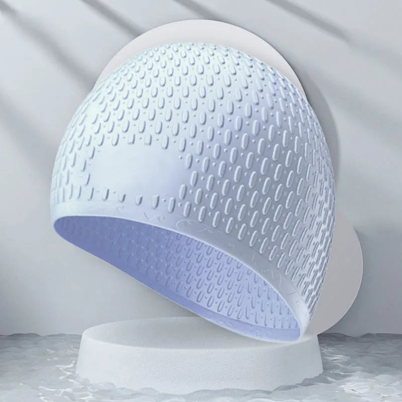 Silicone swimming cap with water drop design in solid colour options