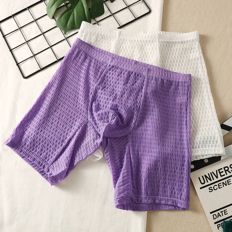 Men's solid colour lace boxer briefs for hip lifting and shaping, shown in light purple.