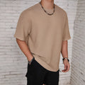 Men's slim fit polyester t-shirt in black colour with round neck and short sleeves
