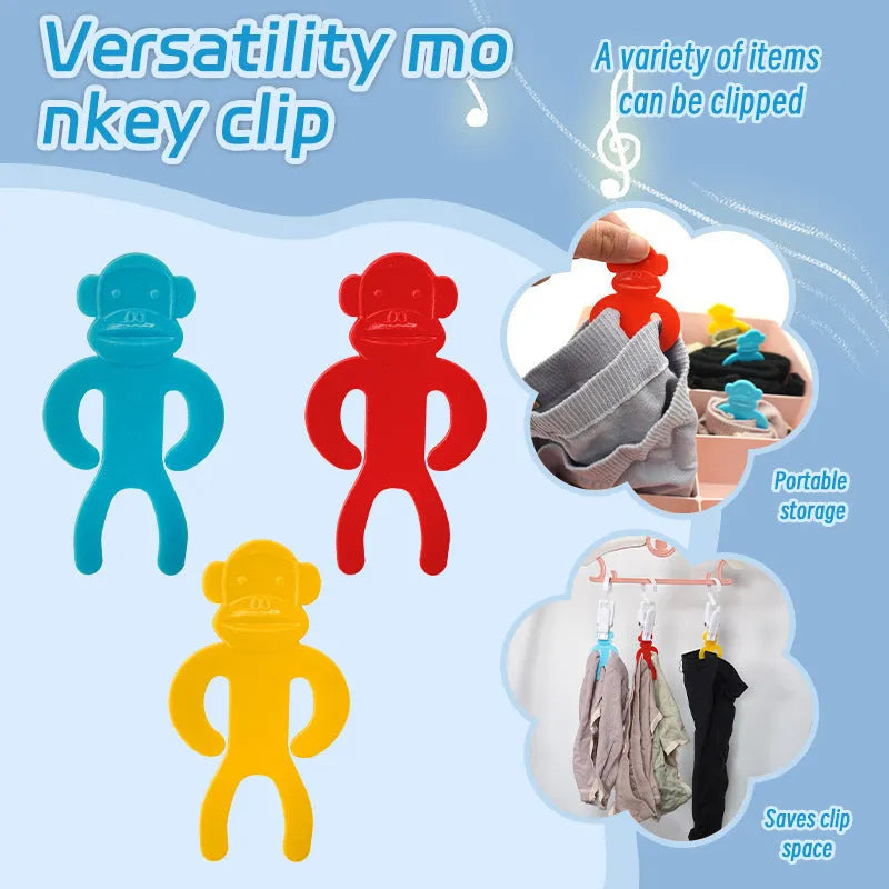 Plastic socks clips in blue, yellow and red colours for laundry organisation