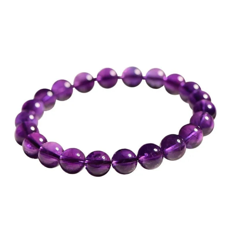 Natural amethyst bracelet with scattered Uruguay beads in selectable sizes and colour grades.