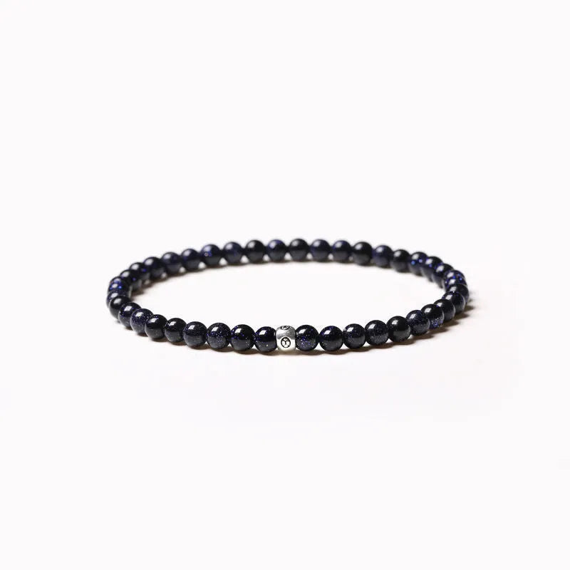 Unisex geometric agate bracelet with 4mm electroplated beads in obsidian black and blue san colours