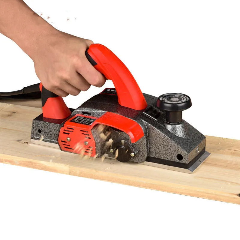 Red aluminium electric wood planer with 82mm working width for desktop woodworking